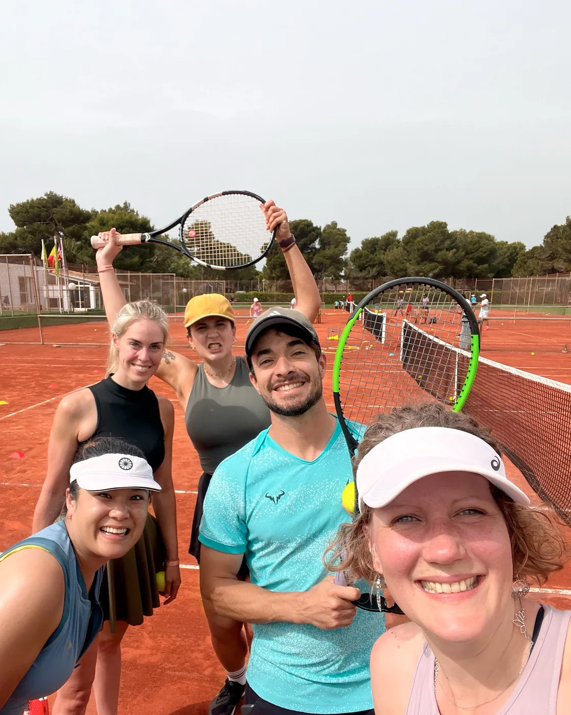 Coach with players after a session