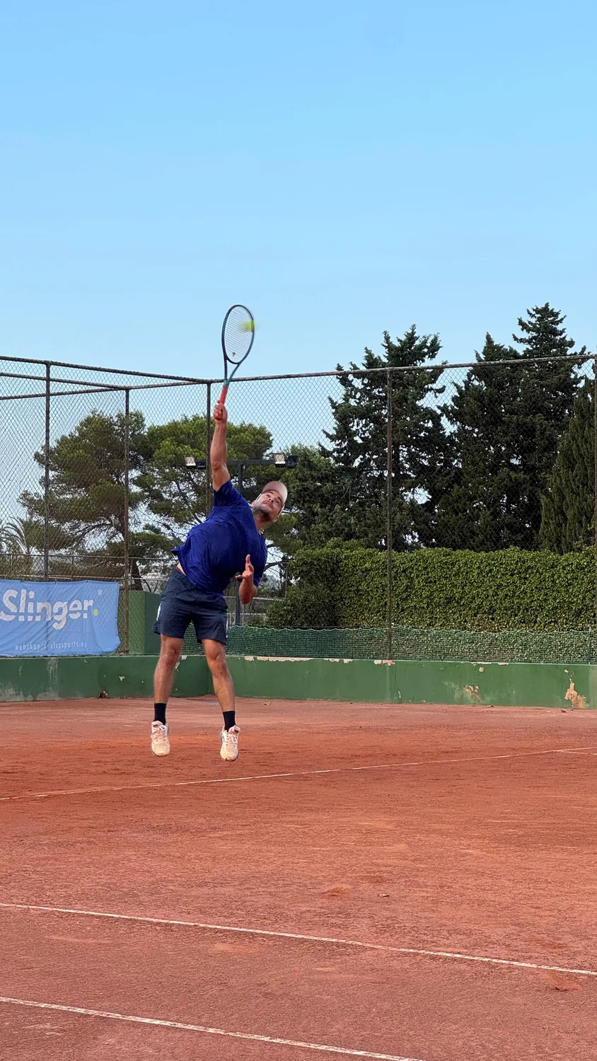 Player serving on clay